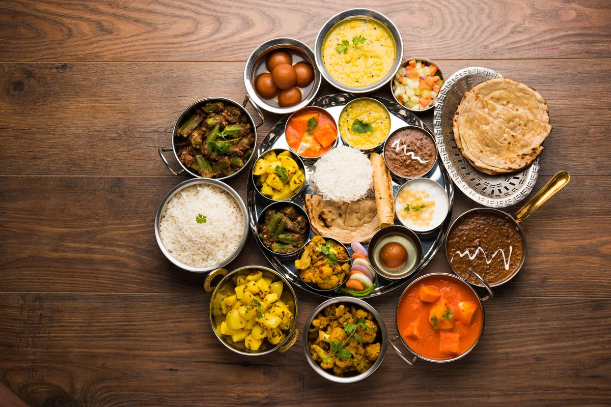 Eat the traditional food, in its home state.